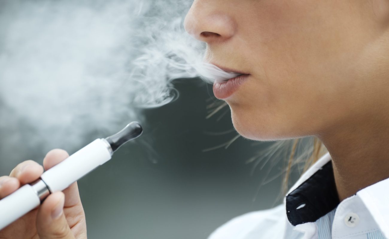 closeup-of-woman-smoking-electronic-cigarette-outd-2025-01-16-13-07-18-utc